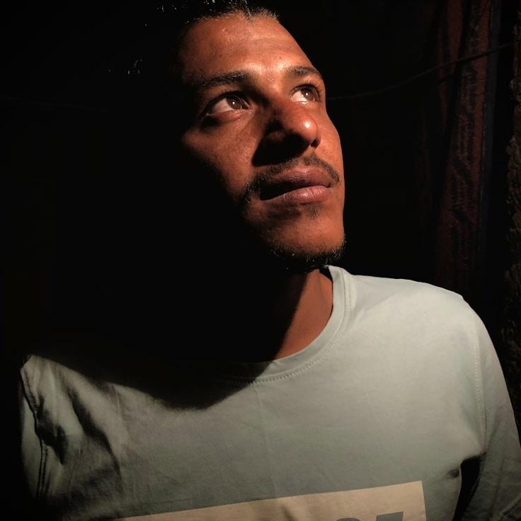 Avery Chen, Lead Design Curator at QuietOriginPath, reviewing corporate floral arrangements